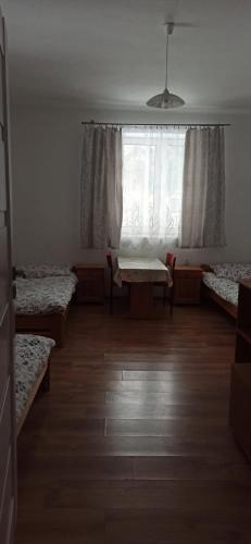 Dom noclegi dla pracowników firm wynajem (Dom noclegi dla pracownikow firm wynajem) in Gora Motyczna