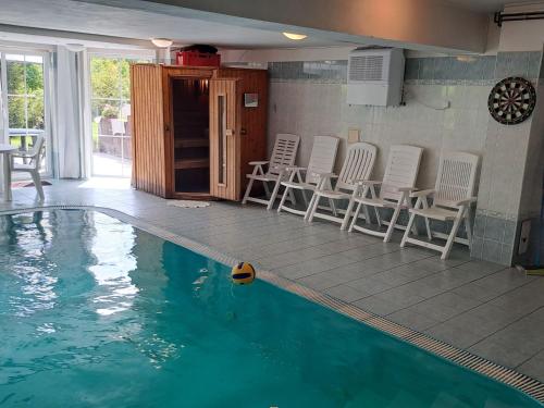 Holiday Home Wellness Villa Vranov 55 inside pool and sauna by Interhome in Poddubi