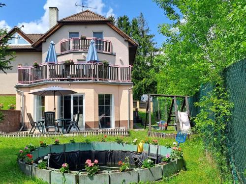 Holiday Home Wellness Villa Vranov 55 inside pool and sauna by Interhome in Poddubi