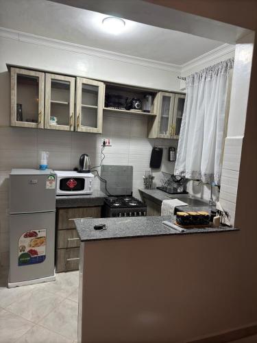 kj suites in Meru