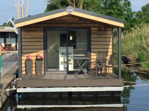 Apartment Hausboot KHT 1 Lacet mit Elektrokamin im Salon- 1 Schlafraum- Küche- Duschbad m by Interhome in Wilhelmshaven, Deutschland