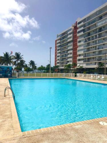 Kolam renang, Private Island- Balcony Ocean view-Entire 1BR Condo-WiFi-AC in Fajardo