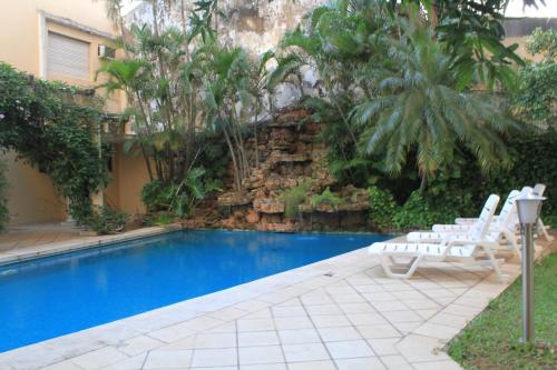 Swimmingpool, Premier Hill Suites Hotel in Asuncion