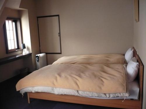 Japanese-Style Family Room with Shared Bathroom