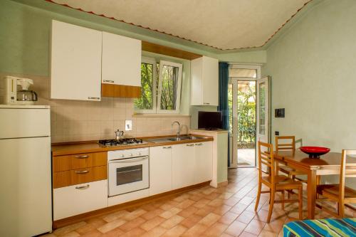 Kitchen, Residence Verdeborgo in Grottaferrata