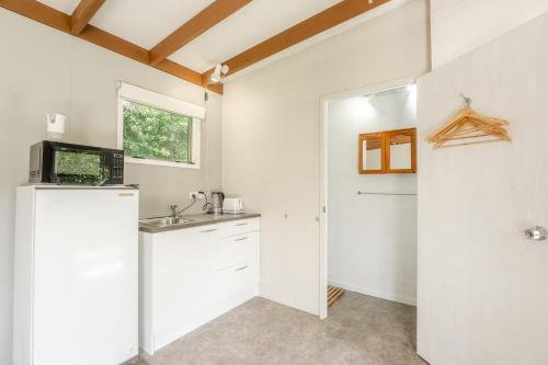 virtuve, Stoneybrook Cabins in Waimauku