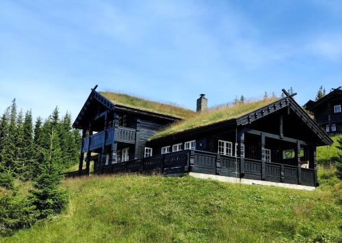 Exclusive family cabin in Hafjell ski-in-ski-out – khách sạn tại Oyer