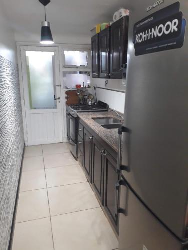 Kitchen, Tu lugar de descanso in Barrio Zacagnini