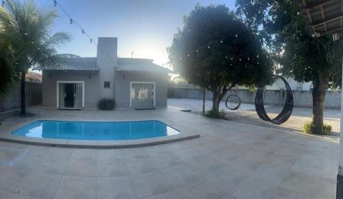 Casa com quadra de areia – khách sạn tại Guaratiba