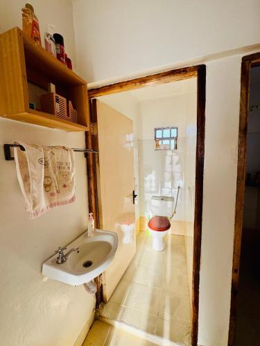 Bathroom, Nkare Cottage in Meru