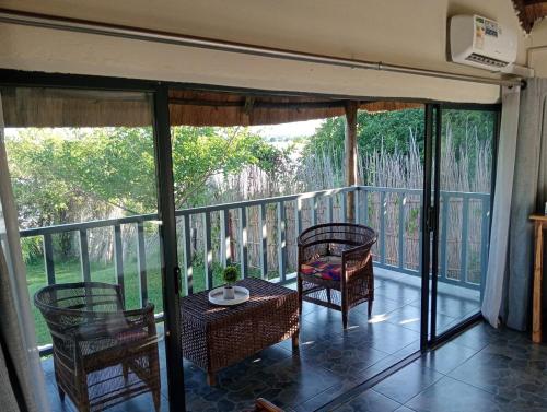 River Frontage Chalets along Zambezi River - Enjoy Game & Canoeing Safaris as well as Boat Cruises & in Mafuta