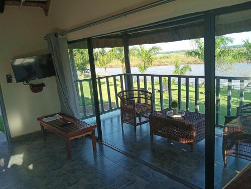 River Frontage Chalets along Zambezi River - Enjoy Game & Canoeing Safaris as well as Boat Cruises & in Mafuta