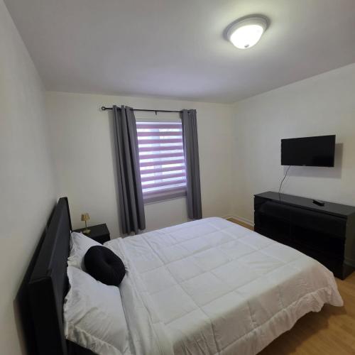 Appartement cosy, comme a la maison in Riviere-des-Prairies-Pointe-aux-Trembles