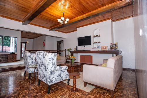kawasan lounge/TV kongsi, Cozy Stead Hotel - Haven House, Gigiri in Nairobi