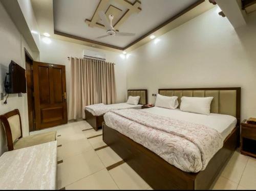 Signature Inn Guest House in Faisal Cantonment