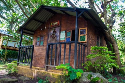 CABAÑA TIPO CAMPING , PISCINA, PUENTES DE AVENTURA, GRANJA baño compartido