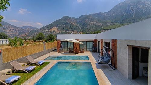 Fethiye de Büyük Havuzlu, Jakuzili Müstakil Villa – khách sạn tại Uzumlu