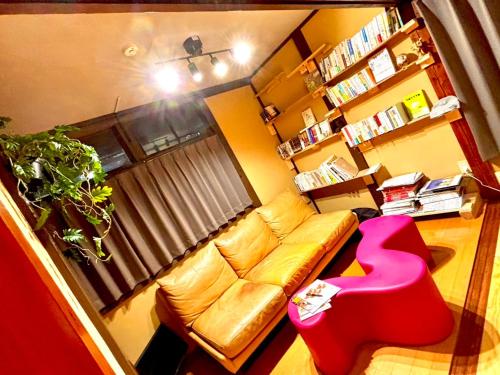 jaettu olohuone/TV alue, GROUNDWORK Guesthouse & Lounge in Yugawara