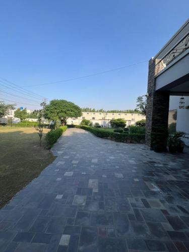 Haven Lodge Lahore by Haven Holiday Homes - 4BR Luxury Guest Suite in a Farmhouse - image 5
