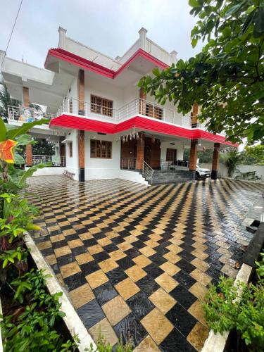 Charming luxurious Villa facing in front of lush rice farm in Ankola