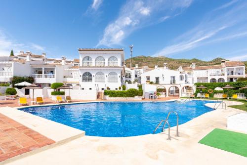 Swimmingpool, Tio Charles in Rancho Domingo