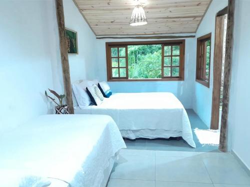 Loft 01 encanto dos ipês – khách sạn tại Praia Grande