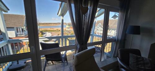 Fewo Granitzblick 6 mit Balkon und Seeblick – khách sạn tại Altensien