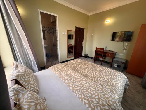 PhyllenHotel Tanga in Taнга