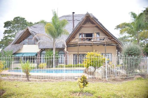 4 Bed Thatched Double Storey with pool No events or Parties - Harare 4 Bed Thatched Double Storey with pool No events or Parties - Harare