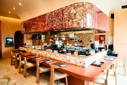 Restaurant, APOM Boutique Hotel - free cable car & sunworld water park in Hon Thom