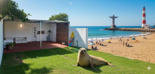 casa tipo departamento con jardin, cochera semicubierta y parrilla