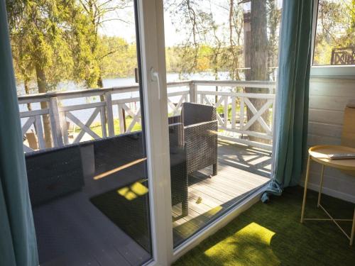 Balkons/terase, Holiday home right on the lake, sauna, jacuzzi in Brodnica Dolna