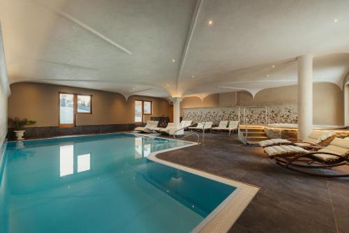 Peldbaseins, Laguscei Dolomites Mountain Hotel in Livinallongo