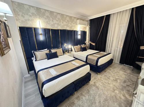 B Corner Hotel Sultan Family & Triple Room