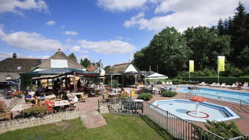 Ресторан, Glamping Holten luxe safaritent 2 in Холт