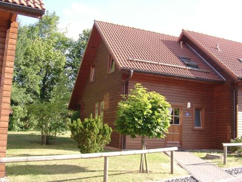 Ferienhaus im Holzblockstil im Naturerlebnisdorf Blauvogel in Hasselfelde, Deutschland