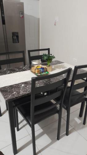 Cozy Escape 876 Secure 2BR with AC, Parking & near Beaches in Spanish Town