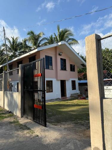 2-story gated house good for families and groups in Guindulman