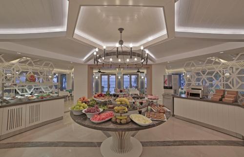 Restaurant, Rawda Resort Hotel Altinoluk in Doyran