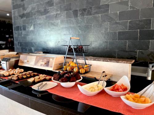 餐廳, Hotel Trinitarias Suites in 巴基西梅托