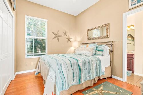 Two-level home with partial ocean view balcony WiFi & W/D - walk to the beach