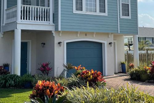 Two-level home with partial ocean view, balcony, WiFi, & W/D - walk to the beach