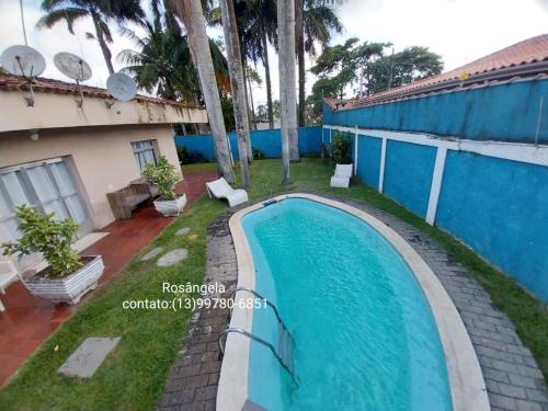 Suíte casal simples com casa compartilhada – khách sạn tại Guaruja