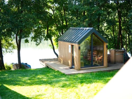 Dārzs, Holiday home right on the lake, sauna, jacuzzi in Brodnica Dolna