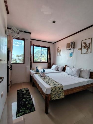 Brenmariel Tourist Inn Room Type - Quadruple Room with Bathroom