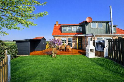 "Huus ant Diek", Ferienhaus mit Maisonette Wohnung in Deichnähe, Nähe Norddeich – khách sạn tại Lintelermarsch
