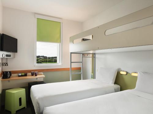 Standard Room with Two Single Beds and One Bunk Bed