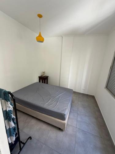 Apartamento Guarujá 50 metros da praia Astúrias – khách sạn tại Asturias