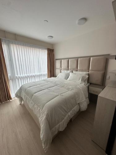 Elegant 1-Bedroom Apartment with Coworking Space