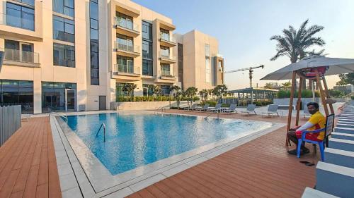 สระว่ายน้ำ, StayShort - Luxury 3BR Canal Front Apartment in a Prime Setting in จูไมราห์
